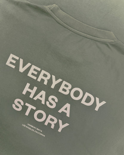 EVERYBODY HAS A STORY T-SHIRT MATCHA LATTE