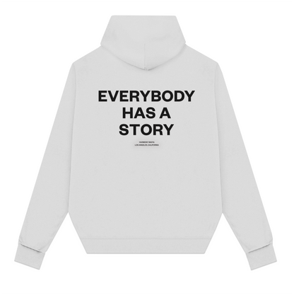 EVERYBODY HAS A STORY HOODIE CEMENT